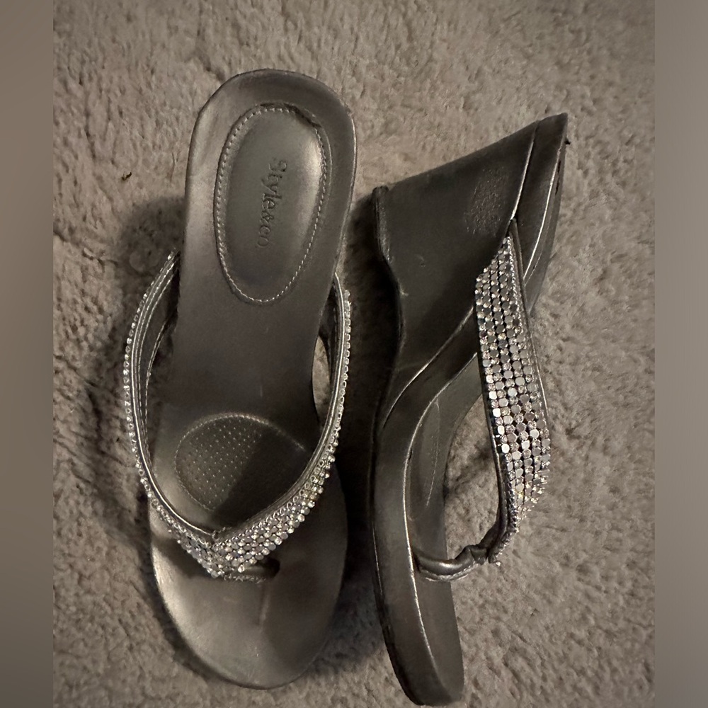 Silver and rhinestone wedge sandals.